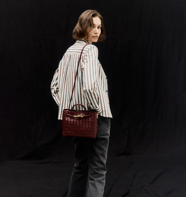 Image 2 of 6 - BROWN - Bottega Veneta small Andiamo handbag featuring intrecciato leather with leather top handle, sliding cross-body strap, compartmented interior with one zippered pocket, two open pockets and magnetic closure. 7.9" x 9.8" x 3.9". 100% lambskin. Made in Italy. 