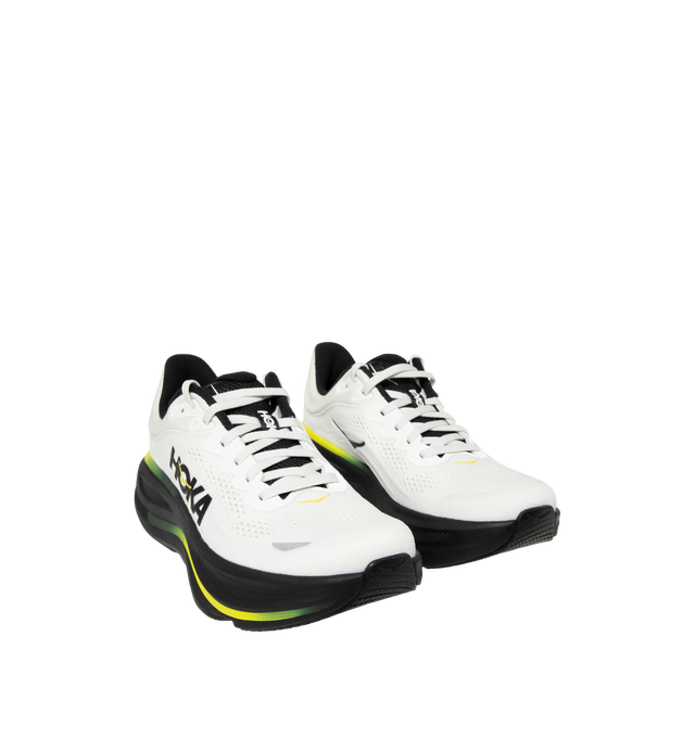 Image 2 of 5 - WHITE - Hoka M Bondi 9 Sneaker featuring engineered mesh upper with rubber sole, lace-up front, foamed EVA midsole and increased stack height for maximum cushioning, zonal breathability, reflective detailing and cushioned tongue and collar. 