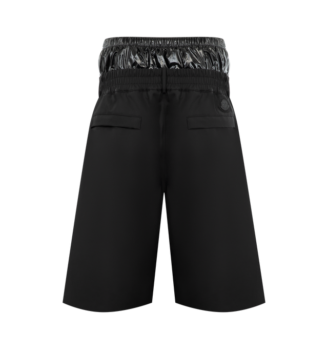 Image 2 of 3 - BLACK - Moncler x A$AP Rocky Logo Print Shorts featuring 3L 4-way stretch nylon, waistband with gaiter, snap button and zipper closure, pockets with snap button closure, logo print and logo patch. 87% polyamide/nylon, 13% elastane/spandex. Padding: 100% polyester. 
