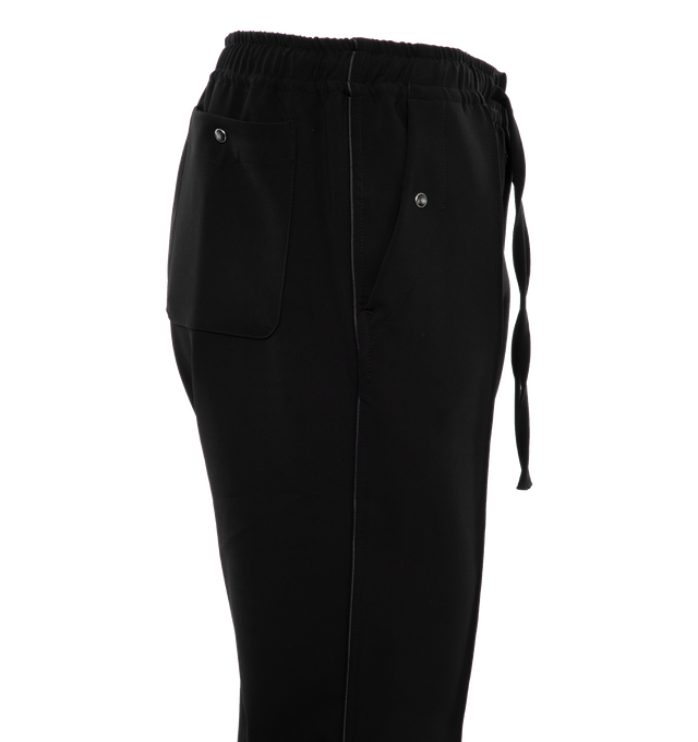 Image 3 of 4 - BLACK - NEEDLES Cowboy Trousers featuring stretch polyester twill, drawstring at elasticized waistband, four-pocket styling, zip-fly, embroidered logo at front leg, pinched seam at legs and piping at outseams. 89% polyester, 11% polyurethane. Made in Japan. 