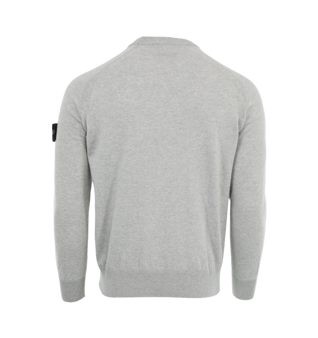 Image 2 of 3 - GREY - STONE ISLAND Raglan Pullover featuring raglan sleeves, ribbed edges, logo badge on the sleeve and has a regular fit. 100% virgin wool. 