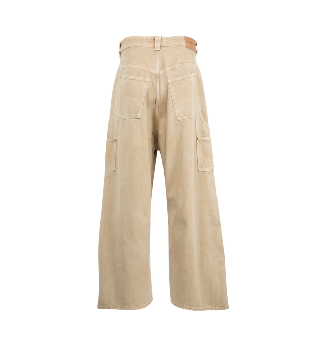 Image 2 of 3 - BROWN - BALENCIAGA Ripped Off Baggy Pants featuring cotton denim, covered zip fly, 5 belt loops, 5 pockets, yokes with rivets at front, ripped at back, Balenciaga engraved flex buttons and jacron at back. 100% cotton. Made in Italy.  