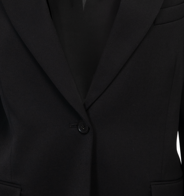Image 3 of 4 - BLACK - THE ROW Viper Jacket featuring tailored single-breasted jacket in starchy wool twill with wide notched lapel, "V" cutout with button closure at back, and multi-pocket detailing. 100% wool. Fully lined in 100% silk. Made in USA. 