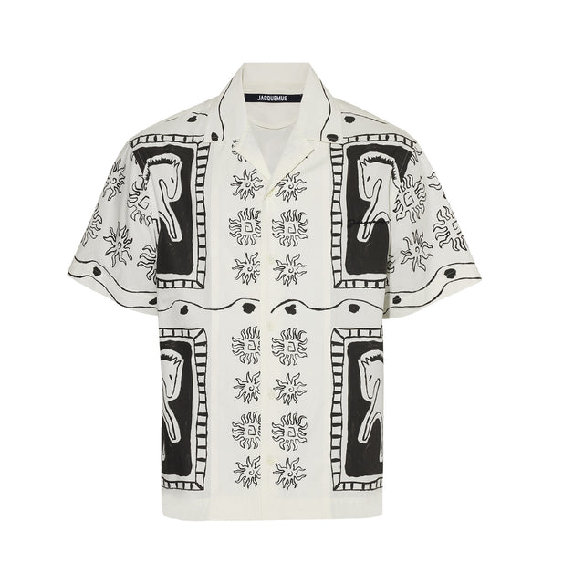 WHITE - JACQUEMUS La Chemise Jean Shirt featuring cotton poplin, graphic pattern printed throughout, open spread collar and button closure. 100% cotton. Made in Portugal.