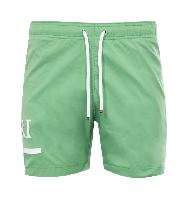 GREEN - AMIRI MA Bar Logo Swim Trunk featuring drawcord at waist, logo at leg, cover back patch pocket, zipped side pockets and classic fit. 90% polyester, 10% spandex.