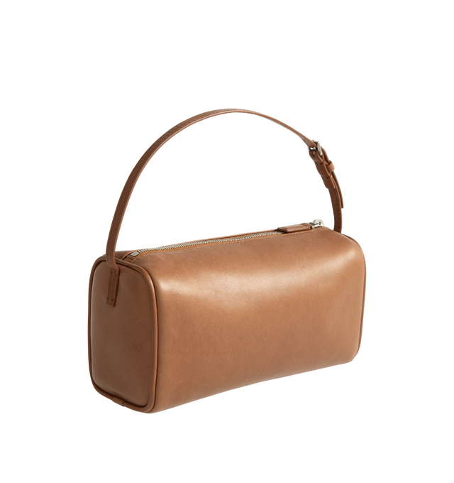 Image 2 of 3 - BROWN - The Row 90's Bag featuring top handle bag in finely grained calfskin leather with softly rounded edges, leather piping and adjustable slim leather strap. 7.7 x 4.5 x 3 in. 100% calfskin leather. Made in Italy. 