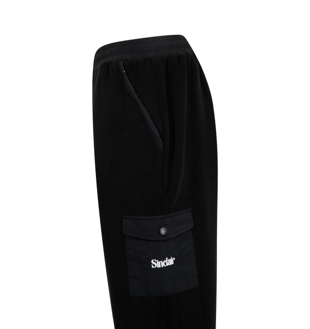 Image 3 of 3 - BLACK - Sinclair Global Fleece Pant featuring pockets with snap closure, drawstring toggles, and embroidered logo at pockets. 