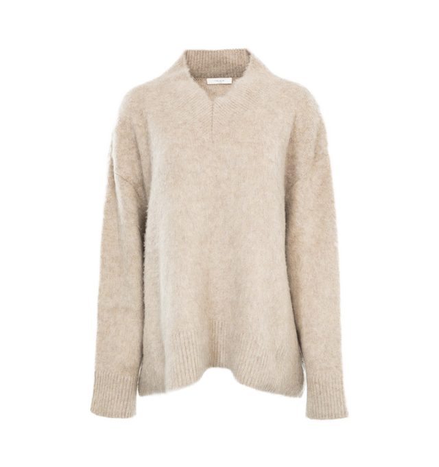 Image 1 of 3 - NEUTRAL - THE ROW Fayette Top featuring oversized fit, v-neck, softly brushed cashmere with dropped shoulder and ribbed neckline, cuffs and hem. 100% cashmere. Made in Italy.