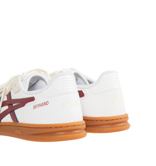 Image 3 of 5 - WHITE - ASICS Skyhand OG Sneakers featuring calf suede, logo-embellished side panels, logo-embroidered tongue, embroidered logo to the rear, round toe, front lace-up fastening, EVA midsole and flat rubber sole. 