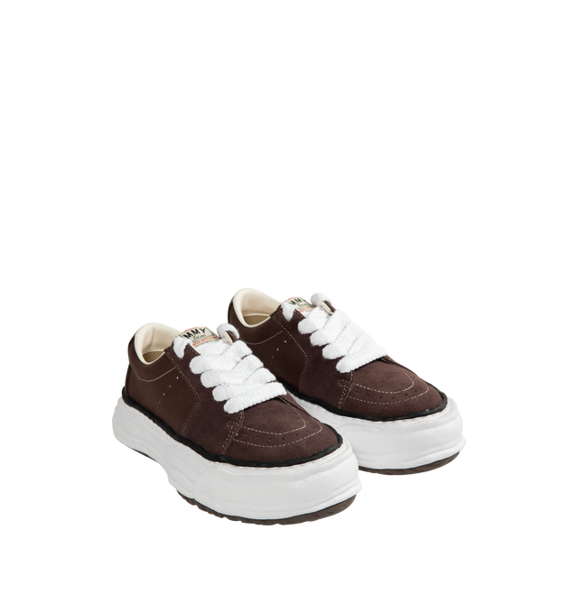 Image 2 of 5 - BROWN - Maison Mihara Yasuhiro Men's Eric Sneakers feature the brand's signature hand-sculpted OG sole, a mixed-material suede and canvas upper, and distinctive toe stitching for a bold contemporary look. Designed for the Spring/Summer 2026 collection, these designer low-top sneakers combine Maison Mihara Yasuhiro's experimental aesthetic with everyday comfort, while the handcrafted-inspired sole and intentional vintage detailing create a truly distinctive silhouette. Main Material: Cow Leath 