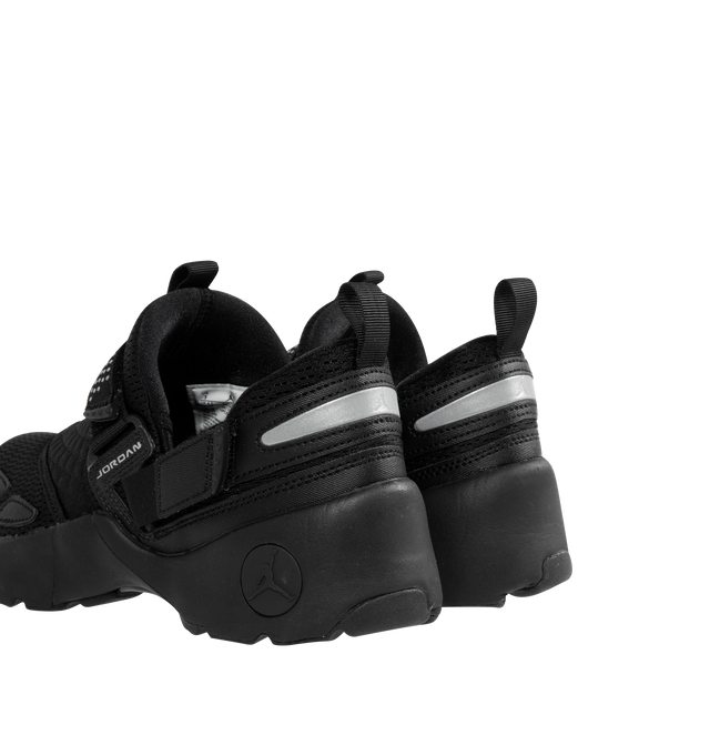 Image 3 of 5 - BLACK - JORDAN Trunner LX Sneaker featuring a forefoot strap for an adjustable fit, synthetic leather mixed with canvas and airy knits, chunky foam midsole, rubber outsole and reflective design details. 