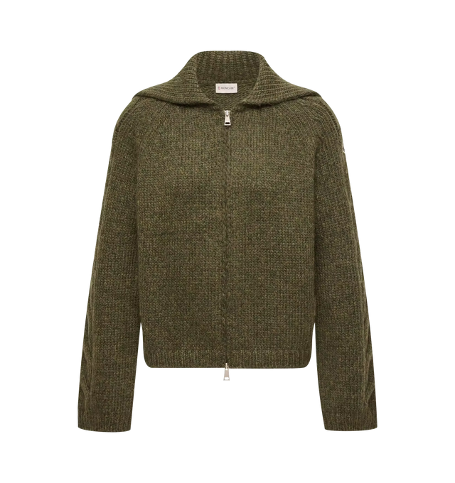 Image 1 of 1 - GREEN - Moncler Women's Alpaca Blend Cardigan is crafted from a soft and tactile alpaca, nylon, and wool blend and features a loose, relaxed silhouette with cable-knit detailing along the sleeves. Designed in a chunky gauge 3 knit, this designer cardigan is finished with a zipper closure and signature Moncler logo patch for a refined take on a seasonless knitwear staple. Main Material: 43% Alpaca, 36% Polyamide/Nylon, 21% Wool. Fit: Loose. Closure: Zipper. Made in Romania. 