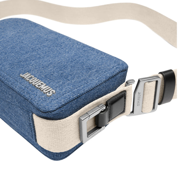 Image 4 of 4 - BLUE - JACQUEMUS Le Cuerda Horizontal Bag featuring adjustable shoulder strap and metal buckle, zip closure with wrist strap, exterior patch pocket, engraved lobster clip, interior patch pocket, silver metal logo and hardware and fully lined in cotton. 12 cm x 23 cm. 100% cotton. 