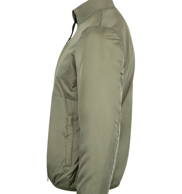 Image 3 of 3 - GREEN - ASPESI Jil Con Jacket featuring a band collar, a front zip fastening, long sleeves, a chest pocket, front zipped pockets and a straight hem. 100% polyamide. 