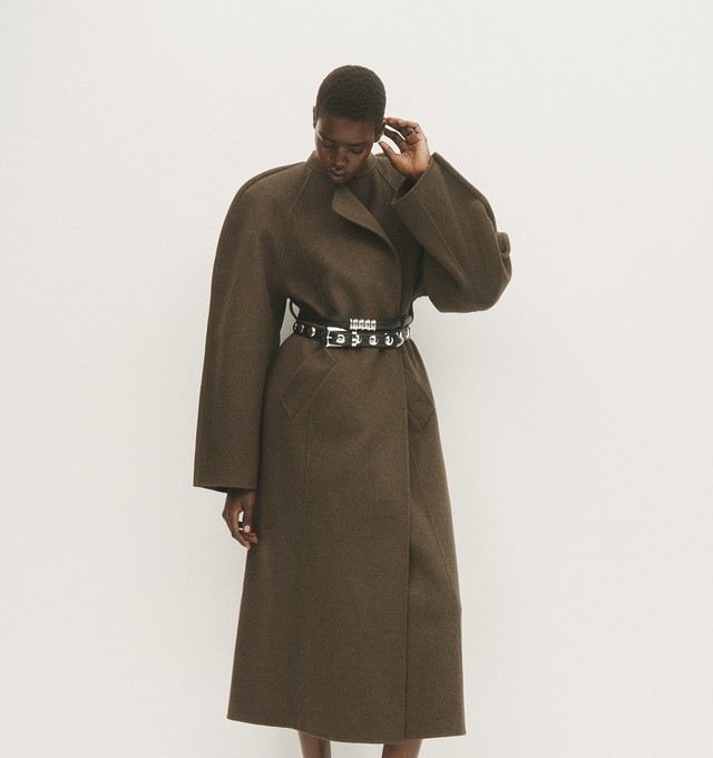 Image 3 of 5 - BROWN - Khaite Rothen Coat has a wrap front silhouette with raglan sleeves, an inverted back pleat, and a sash belt. 100% wool.  