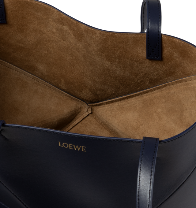 Image 3 of 4 - NAVY - LOEWE Puzzle Fold Tote in medium featuring double top handles, open top and suede lining. 10"W x 12" x 5.75"D. Leather. Made in Spain. 