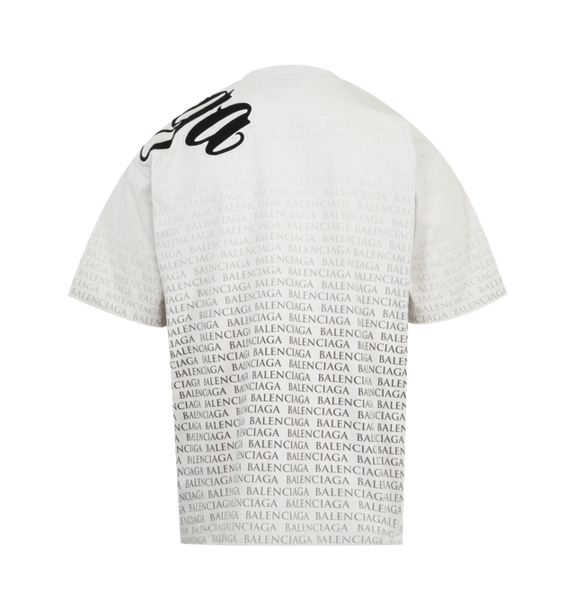 Image 2 of 2 - WHITE - BALENCIAGA Graphic T-Shirt Medium Fit featuring crewneck, short sleeves, Balenciaga graphic logo throughout and dropped shoulders. 100% cotton. Made in Portugal. 