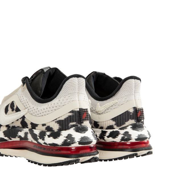 Image 3 of 5 - MULTI - Nike Women's Pegasus Premium Road Running Shoes feature a circular knit upper engineered for lightweight breathability and a foam interior cushion for comfort. Upper: Knit Textile. Outsole: Rubber. Heel-to-Toe Drop: 10 mm.  