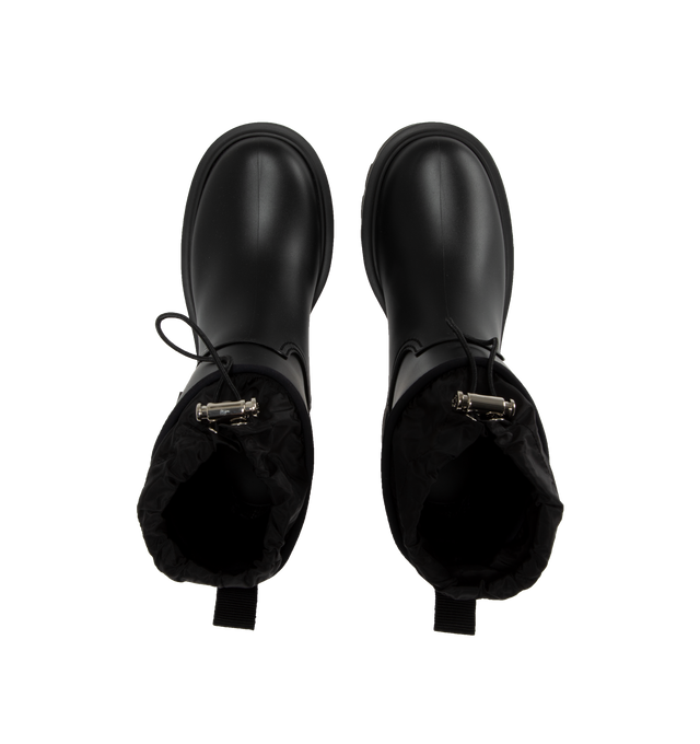 Image 4 of 4 - BLACK - Moncler Kickstream Rain Boots are a pull-on style with drawcord toggle closures, lug soles, and synthetic uppers, linings, and soles. Waterproof.  