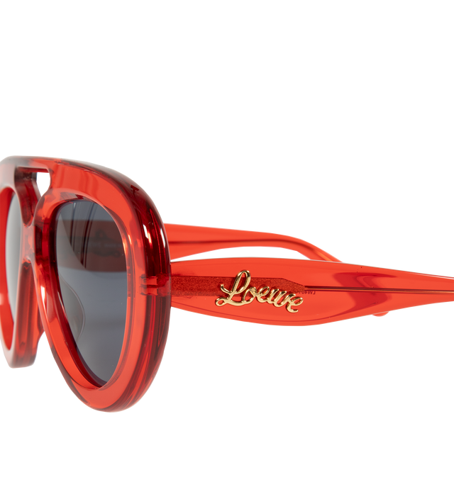 Image 2 of 3 - RED - LOEWE Curvy Pilot Acetate Sunglasses featuring bomb acetate, curvy logo on the temples, solid lenses, saddle nose bridge and tapered arms. Acetate. 100% UVA/UVB protection. 