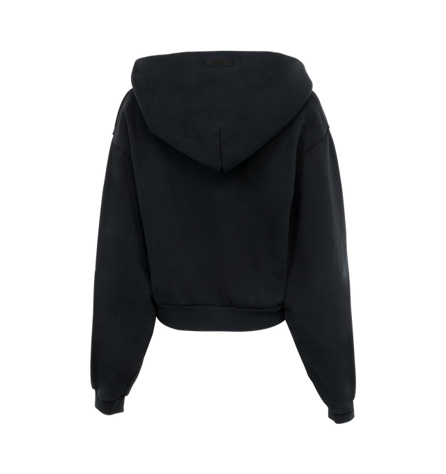 Image 2 of 2 - BLACK - Fear of God Essentials Womens  V-neck cropped, boxy hoodie crafted from heavy cotton fleece featuring an old-English logo university crest graphic at the front, ribbed trims and raw cut v-neck and signature rubberized patch on the hood. 100% Cotton. 