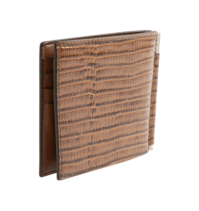 Image 2 of 3 - BROWN - Tom Ford T Line Soft Grain Leather Money Clip Wallet is crafted from soft grain calf leather and features the signature elongated T detail, an integrated money clip, and a compact bi-fold silhouette with multiple card slots for everyday organization. This designer leather money clip wallet combines refined craftsmanship with elevated functionality for daily use. Main Material: 100% Calf Leather. Lining: 70% Calf Leather, 30% Sheep Leather. Dimensions: 10.5 x 9 x 0.8 cm. Made in Italy. 