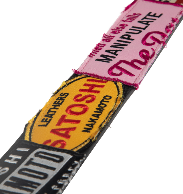 Image 3 of 3 - MULTI - SATOSHI NAKAMOTO Codex Patch Belt featuring  a vibrant patchwork design and a large peace sign buckle. 100% leather. 