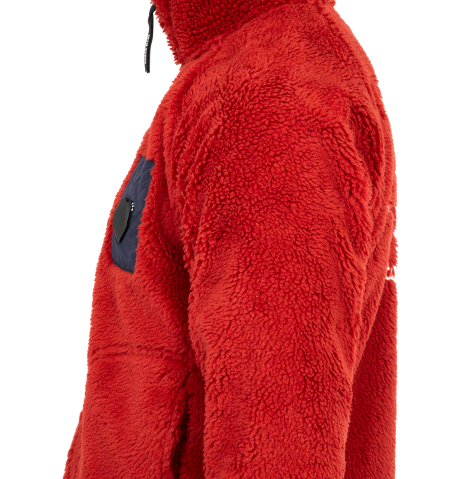 Image 3 of 3 - RED - HUMAN MADE Fleece Jacket featuring soft polyester boa fabric, heart-shaped magic tape on the left chest pocket, removing the tape reveals a text graphic, contrasting piping and pockets, chain-stitched animal graphic on the back, heart-shaped snap buttons on the cuffs and mesh lining with wind-proof film. 100% polyester. Contrast: 100% nylon. 