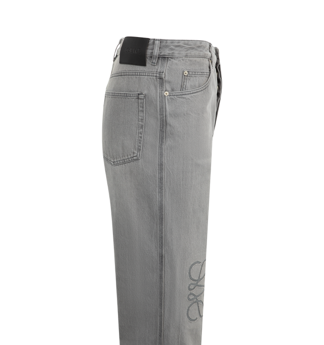 Image 2 of 2 - GREY - LOEWE Anagram Baggy Jeans featuring medium-weight washed cotton denim, relaxed fit, regular length, mid waist, loose leg, tonal Anagram cut-outs at the knees?, belt loops, concealed button fly?, five pocket style? and LOEWE embossed leather patch placed at the back. 100% cotton. 