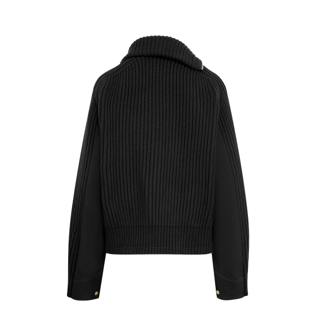 Image 2 of 4 - BLACK - Sacai x Carhartt WIP Women's Duck x Wool Knit Blouson is a hybrid of Carhartt WIPs Detroit Jacket and sacais knit blouson. Featuring two front layers on the body and sleeves, made from Carhartt WIPs duck canvas fabric, with rib-knit, spun wool and nylon yarn, an asymmetric front opening with a double zipper, and a high neck that can be worn up or down to form a flat collar, and co-branded woven label. A co-branded woven label appears on the front. Organic cotton canvas, Knit material  