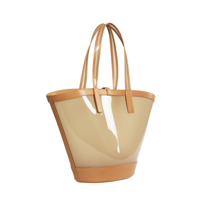 Image 2 of 3 - BROWN - SAINT LAURENT Panier Medium Bag featuring transparent vinyl, leather trim, cassandre hook closure and open top. 9.3"19.3" X 12.8" X 3.9"5.9". Polyurethane.  