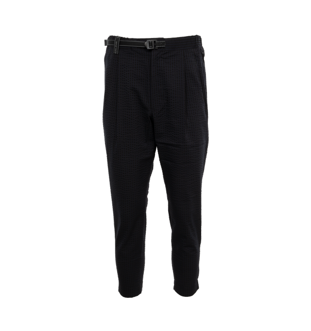 Image 1 of 4 - NAVY - AND WANDER Seersucker Pants featuring zipper closure, snap-button fastenings, side slit pockets, back pockets and pleats. 