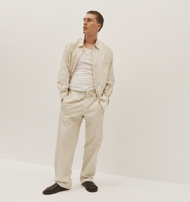 Image 4 of 4 - WHITE - Lemaire Relaxed Workwear Shirt has a classic collar, a snap-fastening front, button cuffs, and a chest patch pocket. 100% cotton.  