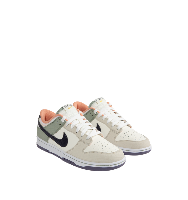 Image 3 of 6 - MULTI - NIKE Dunk Low Retro SE Sneaker inspired by the vibrant heritage of New Orleans featuring padded collar, perforated toe box, foam midsole and rubber outsole. 