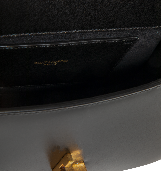 Image 3 of 3 - BLACK - SAINT LAURENT Solferino Mini Bag featuring box leather with a CASSANDRE closure, fully lined in leather, rounded lines, an adjustable strap for shoulder wear and bronze-tone hardware. 7.5" x 4.7" x 3". Calfskin. Made in Italy. 