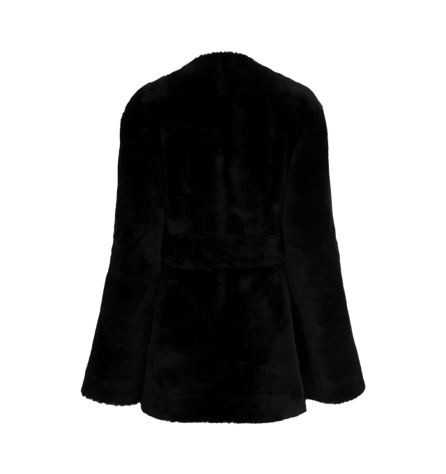 Image 2 of 3 - BLACK - TOTEME Plush Shearling Jacket featuring plush shearling with a suede reverse, slip pockets, hip-length, straight silhouette closing with a detachable belt and internal hooks. 100% lamb leather. 