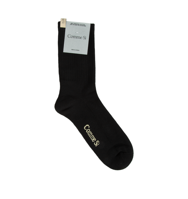 BLACK - COMMES Si The Yves Socks have a wide rib, reinforced toe, and decorative logo ribbon. 78% cotton and 22% polyamide. Made in Italy.