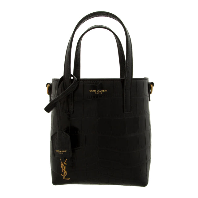 BLACK - SAINT LAURENT YSL Mini Toy Shopper Bag has a snap button closure, YSL signature charm, detachable and adjustable shoulder strap, and bronze tone hardware.  100% calfskin leather. Made in Italy. 