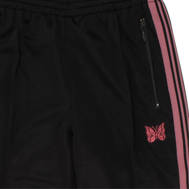 Image 2 of 2 - BLACK - NEEDLES Narrow Track Pants have an embroidered logo, side seam stripes, elastic waist, and side pockets. 100% polyester.  